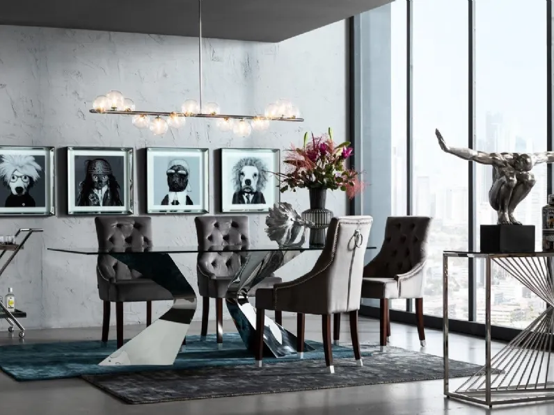 Tavolo Gloria con top in vetro e gambe in acciaio laccato argento di Kare Design