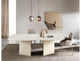 Il tavolo Lovely in vetro effetto cemento di Capodarte è un esempio di design contemporaneo che unis