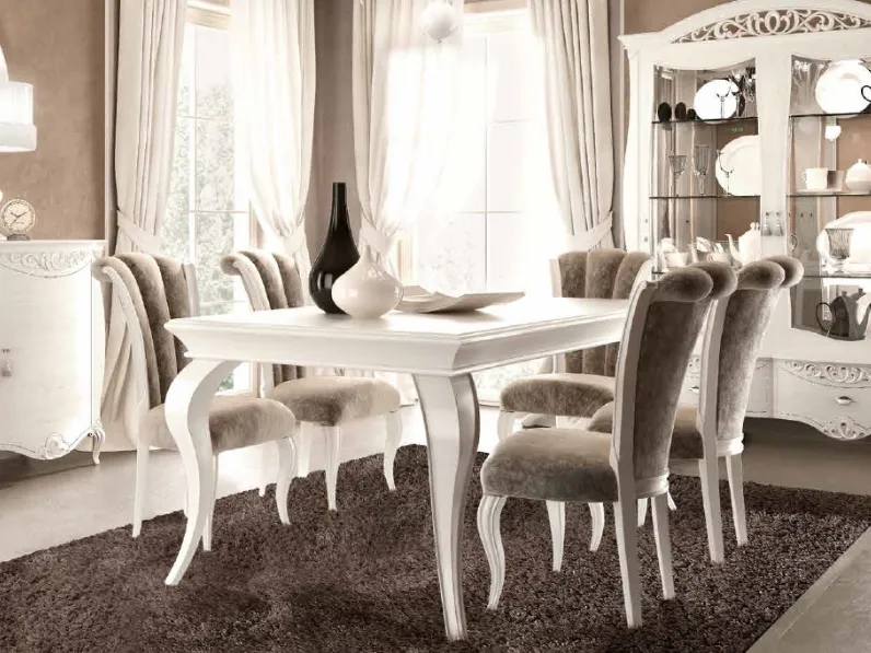 Tavolo Naxos rettangolare allungabile mod 3653 e sedie mod 3654 rivestite tessuto di Signorini&Coco