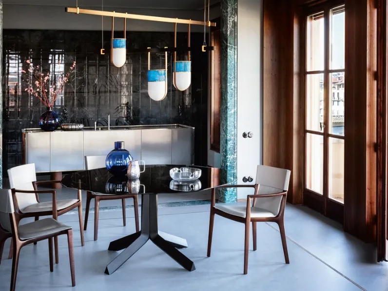 Tavolo rotondo Othello in cristallo fumè di Poltrona Frau