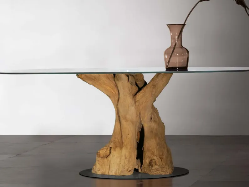 Tavolo Sequoia con basamento in radice di teak, top in vetro trasparente e base in metallo di Nature Design