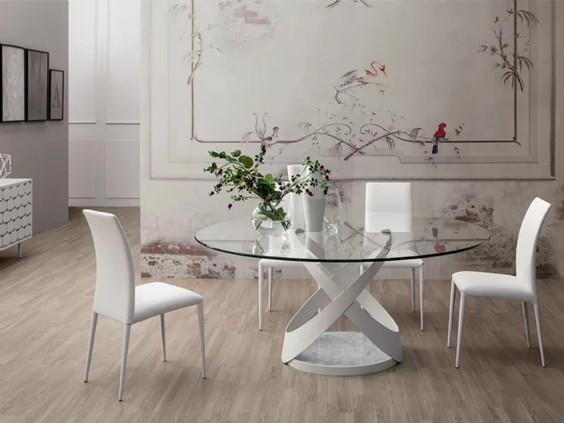 Tavolo Capri con struttura in metallo, base in marmo e top in vetro di Tonin Casa