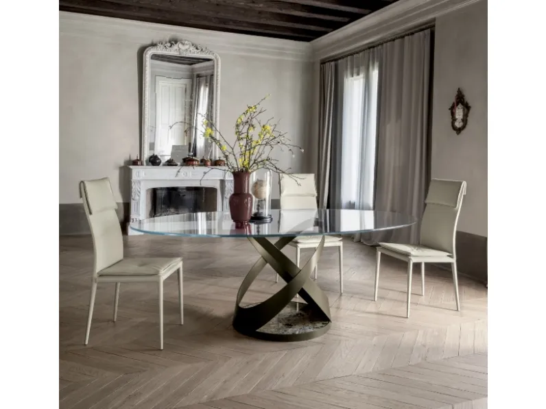 Tavolo Capri con struttura in metallo, base in marmo e top in vetro di Tonin Casa