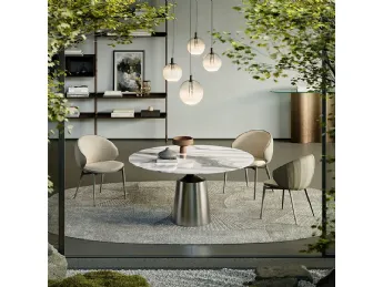 Il tavolo rotondo Yoda Marble di Cattelan Italia è un capolavoro di design e eleganza.