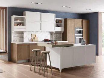 Cucina classica contemporanea con isola, unendo tradizione e design moderno.