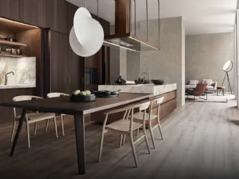 Il tavolo integrato della cucina Design Convivium di Arclinea è ideale per chi ama cucinare con gli 
