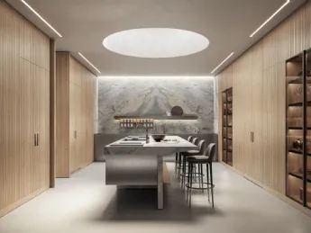 L’isola è protagonista della cucina design “Lignum et Lapis” di Arclinea, firmata dall’architetto Ma