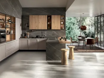 Cucina Atelier Contemporaneo 04 Astra: design moderno con penisola per spazi fluidi e funzionali.