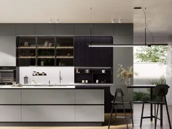 Cucina moderna con isola Domino, firmata Prima Cucine: design essenziale e funzionalità su misura.
