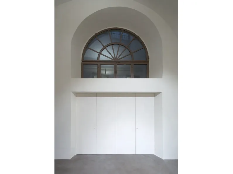 Porta con 4 ante a libro per interni per chiusura vano ascensore Fantasmino di RasoParete