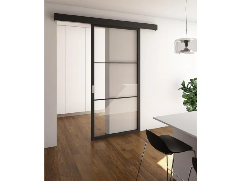 Porta per interni scorrevole Flat F3 in vetro con struttura in legno di Foa