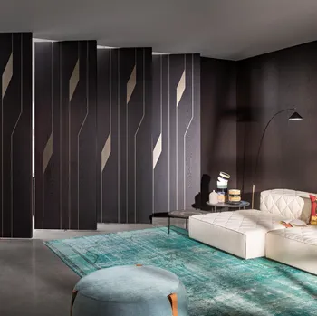 Porta per interni divisoria in rovere moka con inserti in bronzo a bilico Teatro di Lualdi
