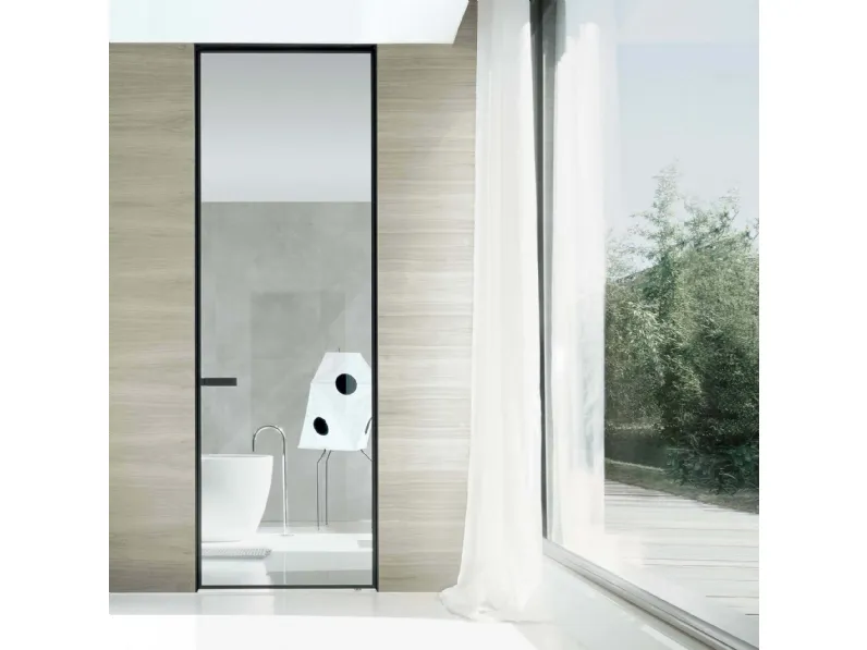 Porta a battente con chiusura magnetica per interni Vela di Rimadesio