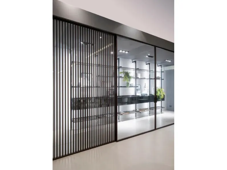 Porta per interni Zeus Tokyo con profilo in alluminio finitura Rovere e vetro di Doal