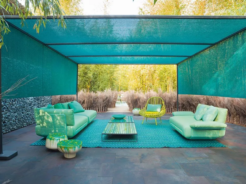 Poltroncina Giunco in alluminio rivestito in filato treccia di Paola Lenti