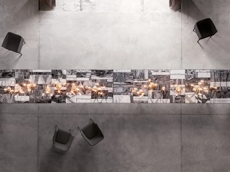 Tavolo da giardino Sciara in lava e vetro di Paola Lenti