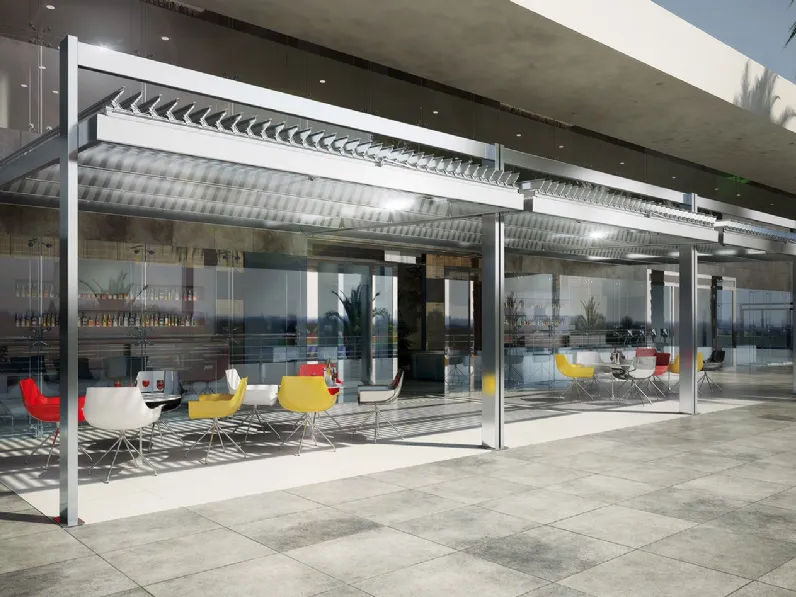 Pergola bioclimatica frangisole inclinata a lame longitudinali orientabili con movimentazione manuale Koevo Addossata di Dirello