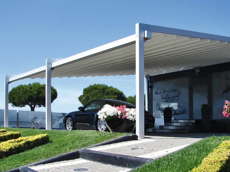 Pergola contemporanea dal design innovativo in alluminio con telo ad impacchettamento Evo di Pratic